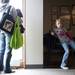 Rhianna Souza, seven, waits while her mom, Michelle, talks on the phone on Saturday. Daniel Brenner I AnnArbor.com